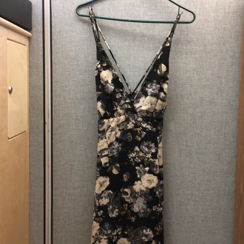 Black flowery thin strap dress.